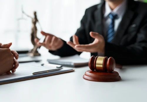 Attorney discussing legal options with a client in a tribal and immigration law matter